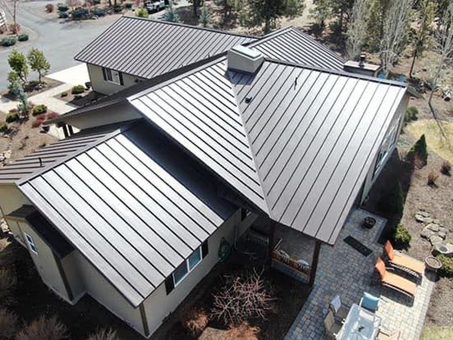 Aerial view of standing-seam metal roof on a Bend home